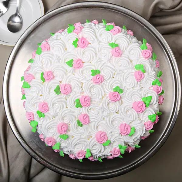 Strawberry Cake with White Flower Frosting
