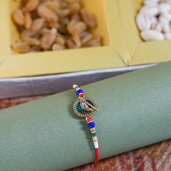 Pious Krishna Rakhi with Designer Dry Fruit Box