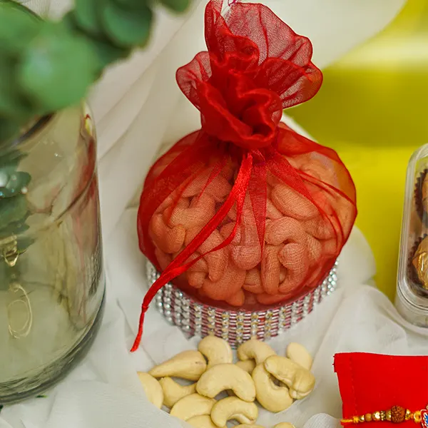 Sacred Ganesha Rakhi with Dry Fruit & Chocolates