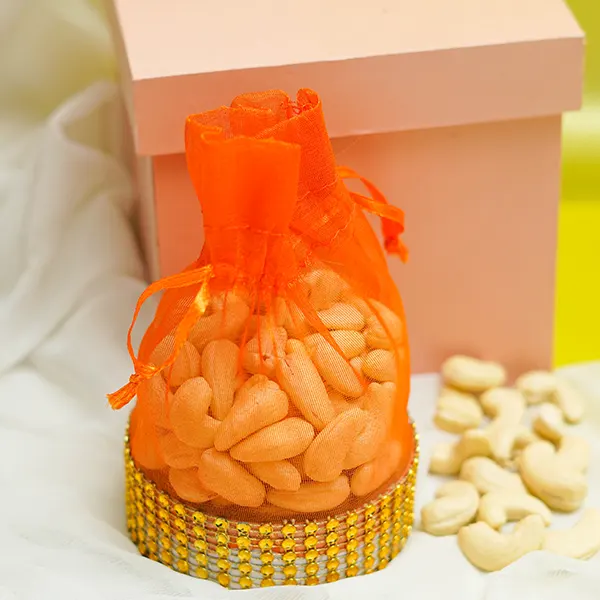 Designer Metal Rakhi with Chocolates & Cashew Nuts