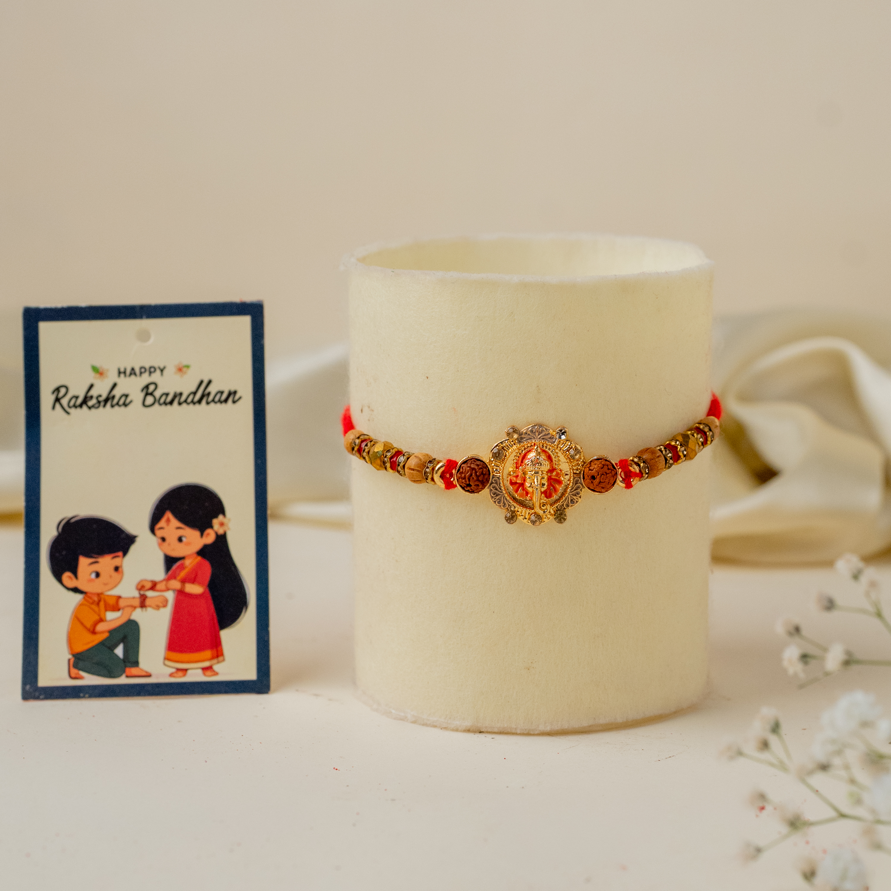 Ganesh rakhi with cake