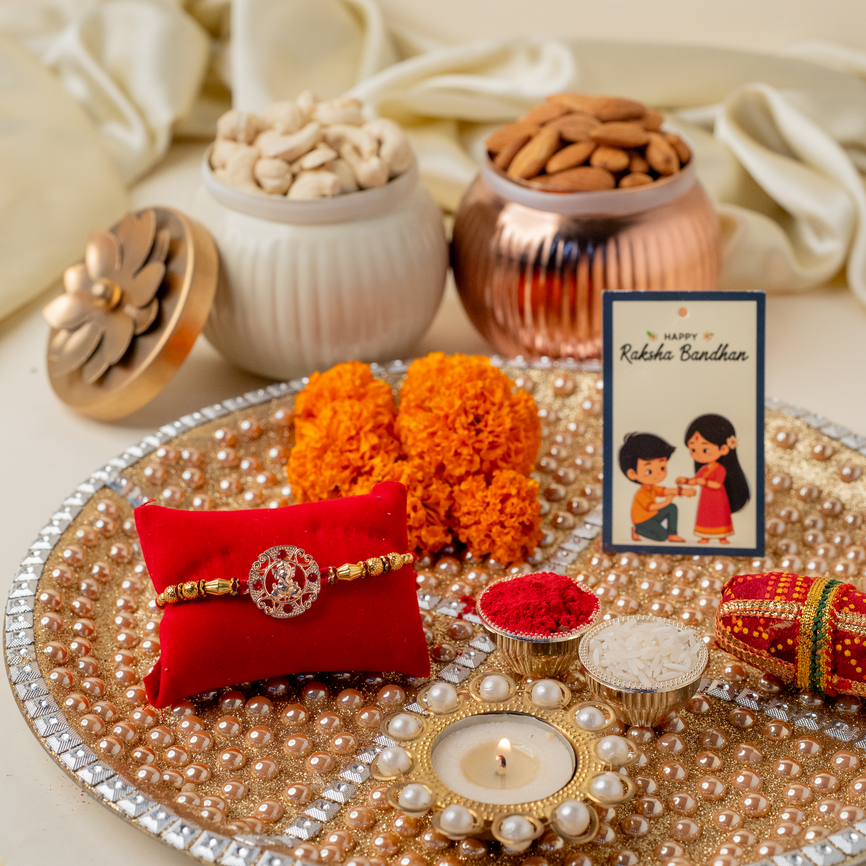 Golden Thaali & Ganesh Rakhi Golden Thaali & Ganesh Rakhi