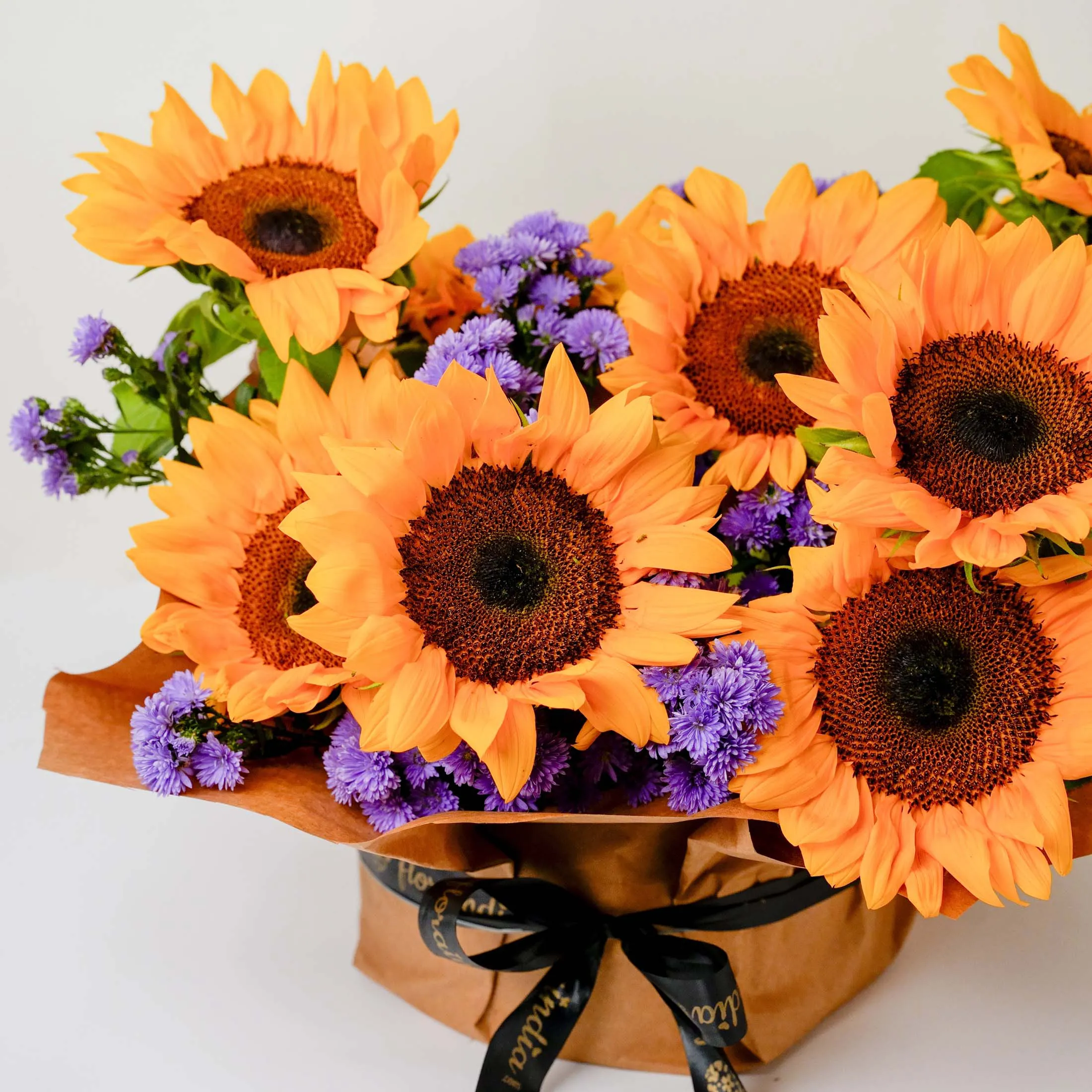 Sunflowers and Blue Daisies in Vase