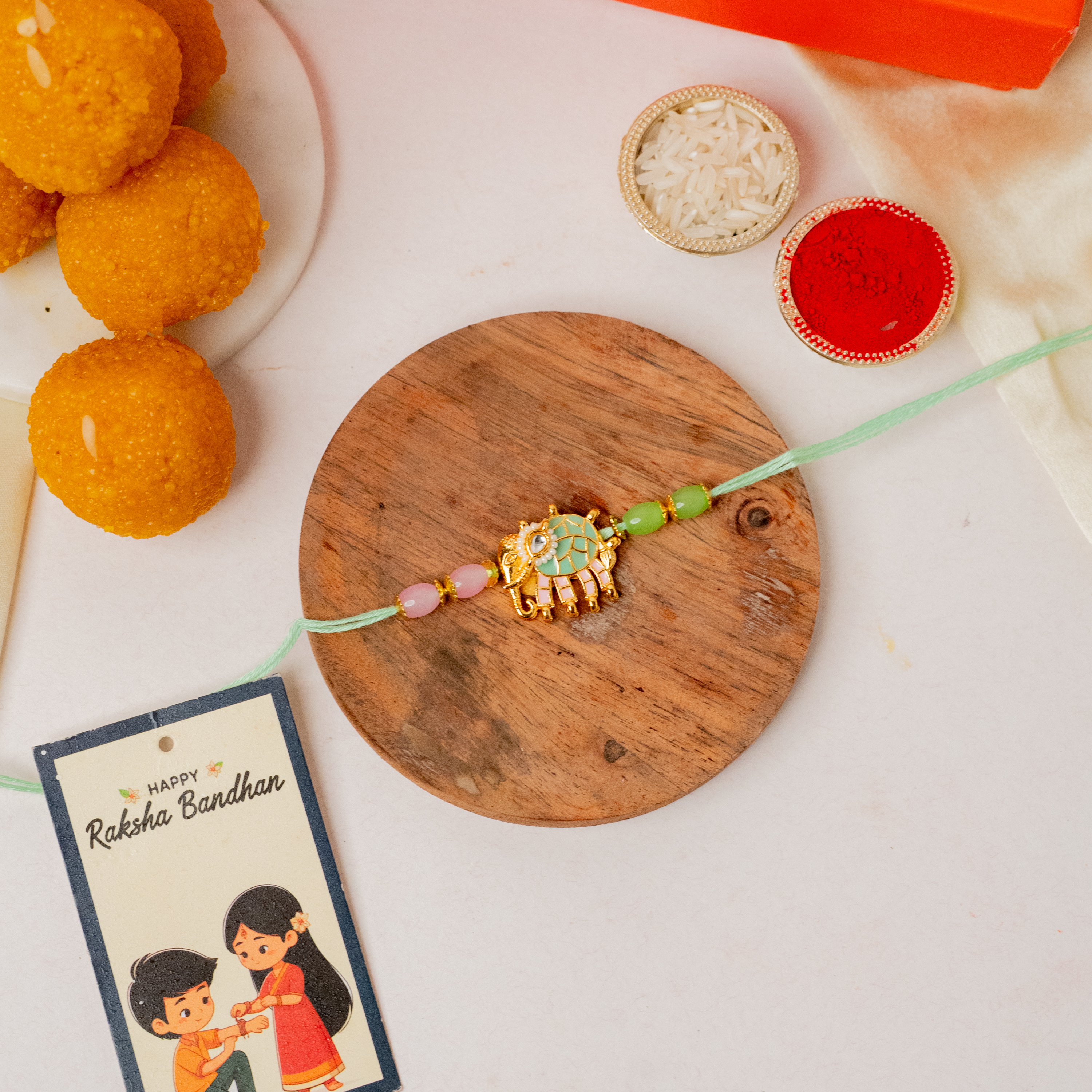 Pastel Elephant Rakhi & Ladoo