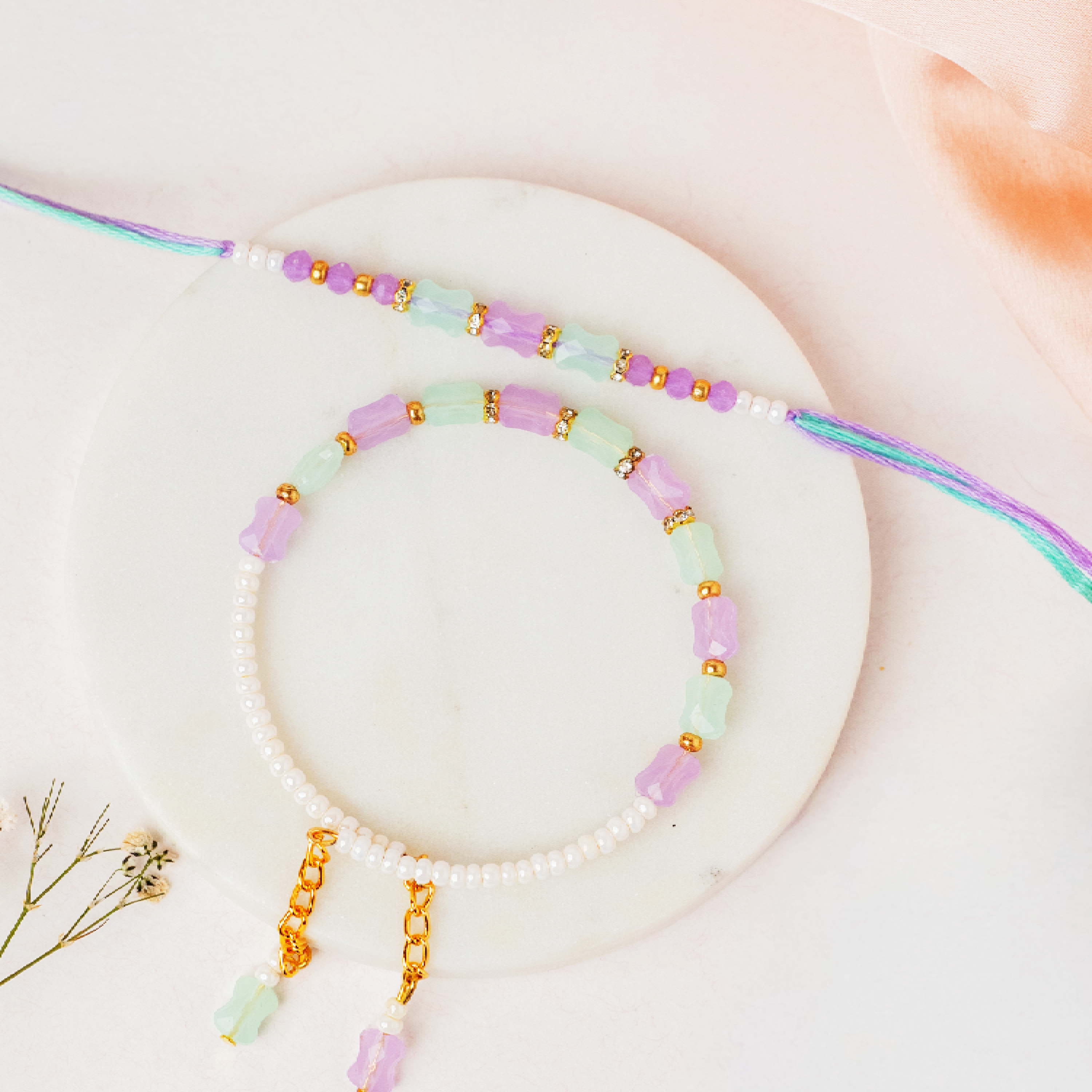 Pearl Lumba Rakhi with Ladoo