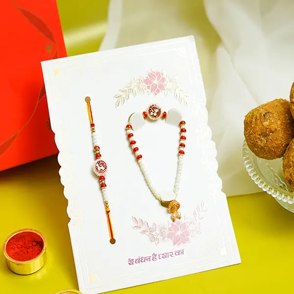 Om Studded Rakhi with Pearl Lumba & Sweets