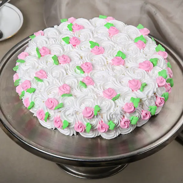 Strawberry Cake with White Flower Frosting