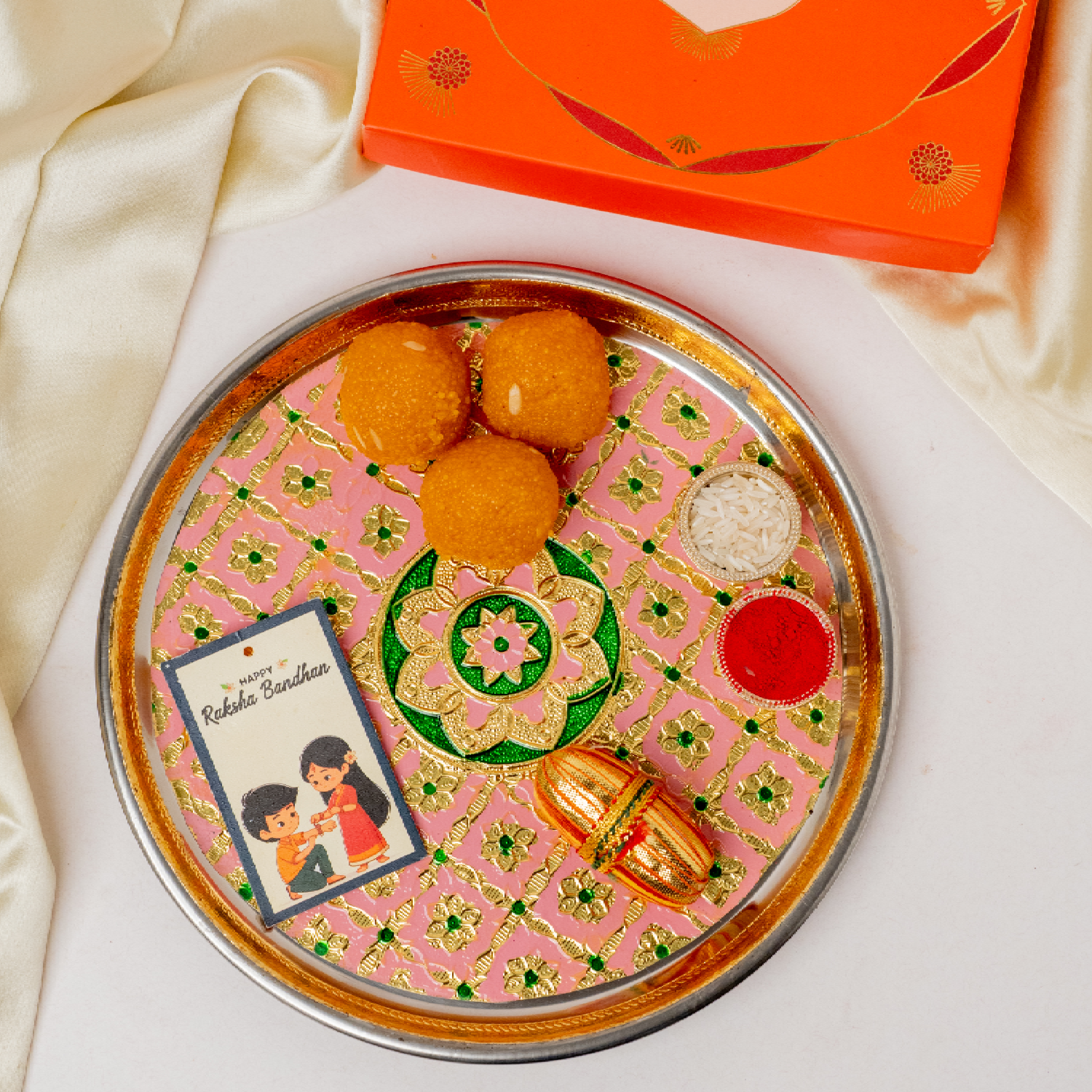 Lotus Rakhi & Pastel Thaali Lotus Rakhi & Pastel Thaali