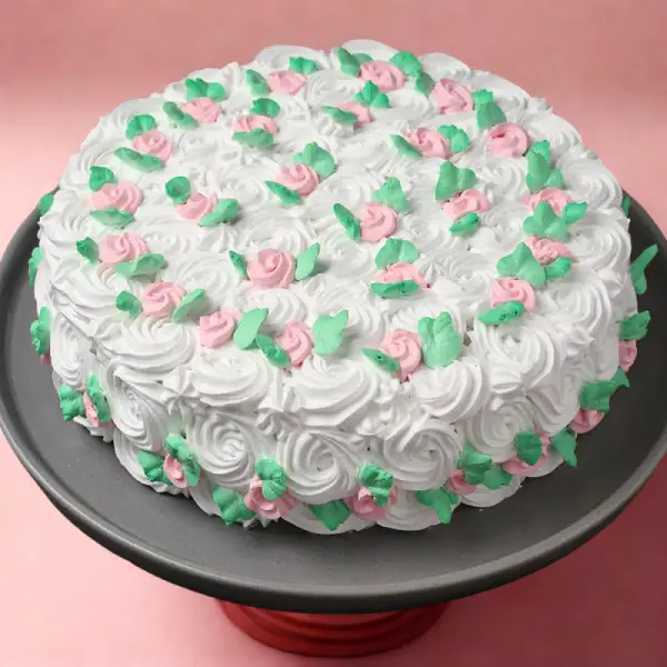 Strawberry Cake with White Flower Frosting