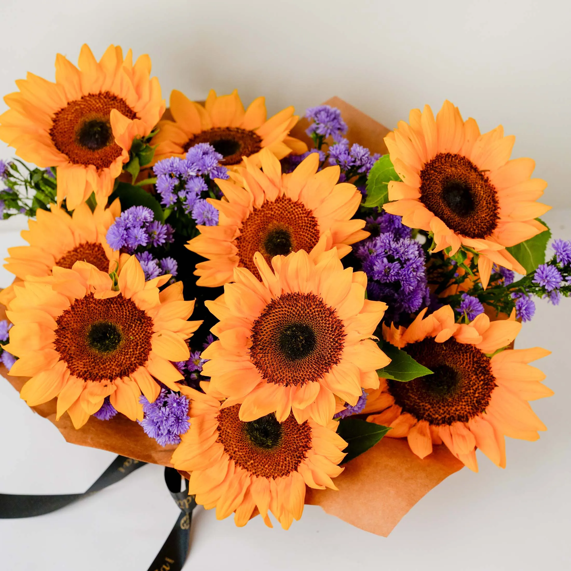 Sunflowers and Blue Daisies in Vase