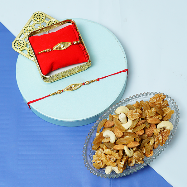 Stone Studded Metal Rakhi with Cashews