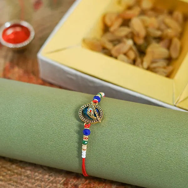 Pious Krishna Rakhi with Designer Dry Fruit Box