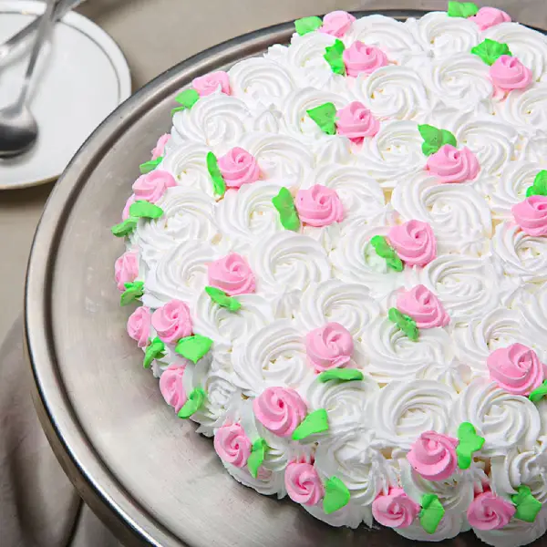 Strawberry Cake with White Flower Frosting