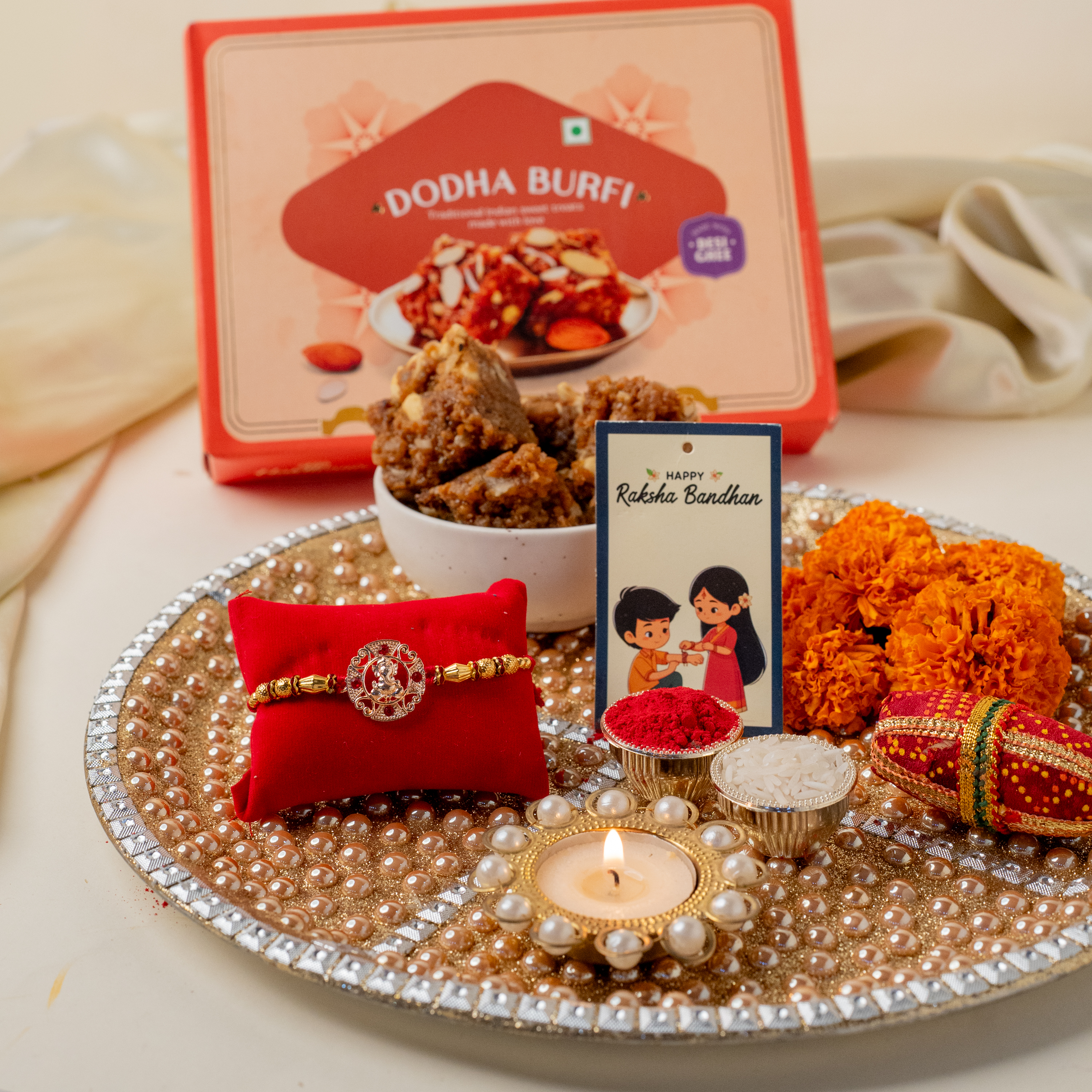 Pearl Thali with Ganesh Rakhi